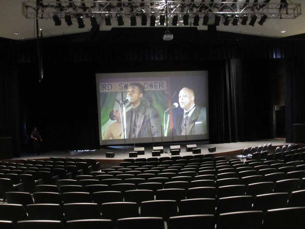 Testing out the video on the giant screen.  Photo by Classic Urban Harmony.