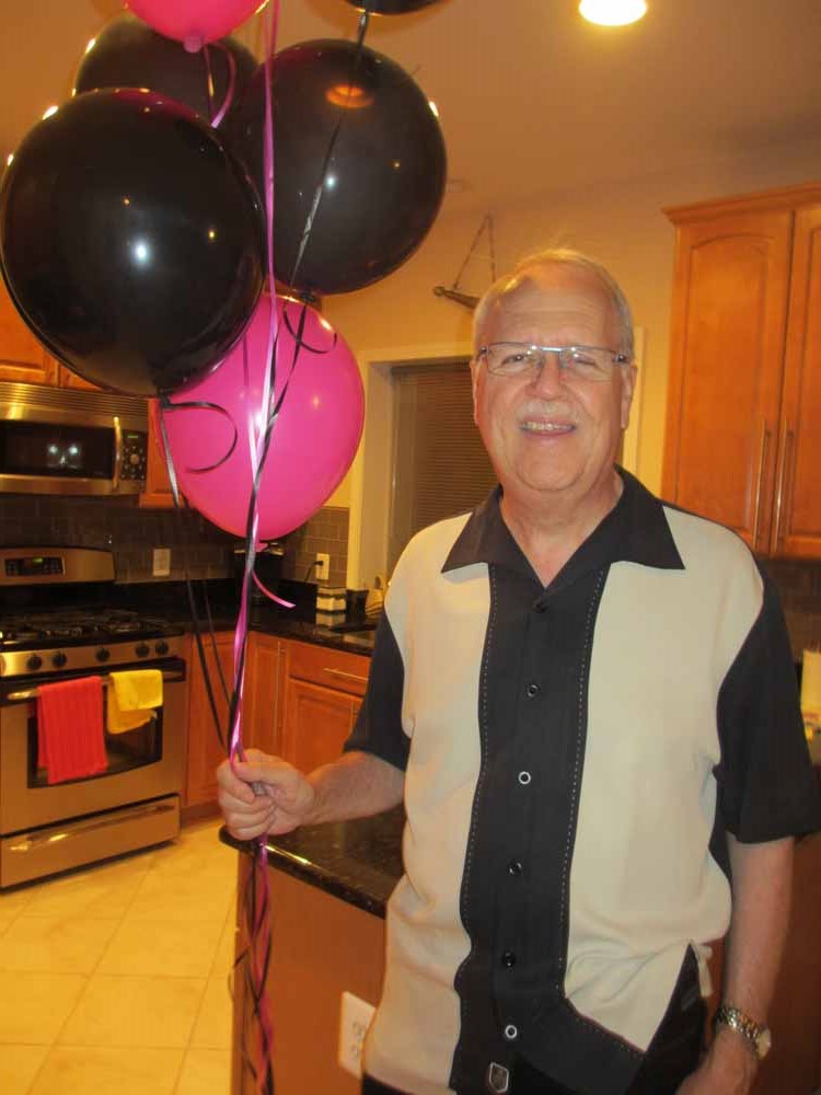 Charlie Horner with the baloons.