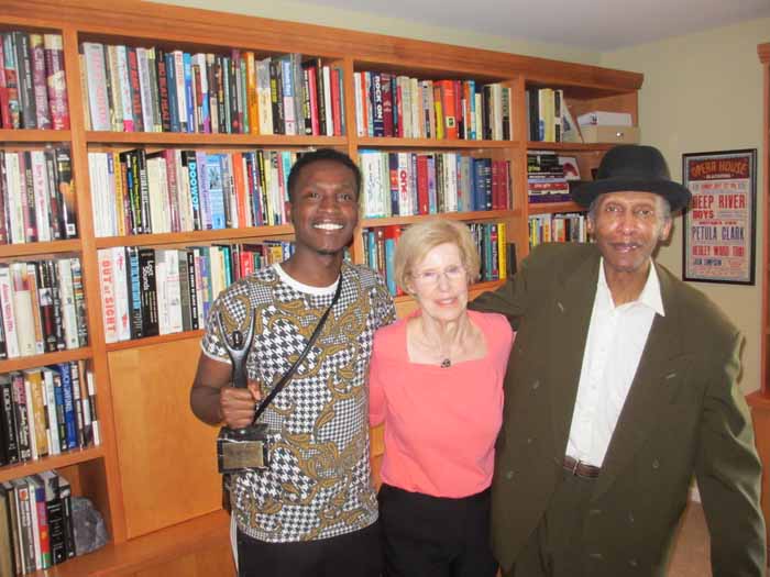 Sonny Til's grandson, De'Sean and son Ricky, with Pam at CUH Headquarters, 2015